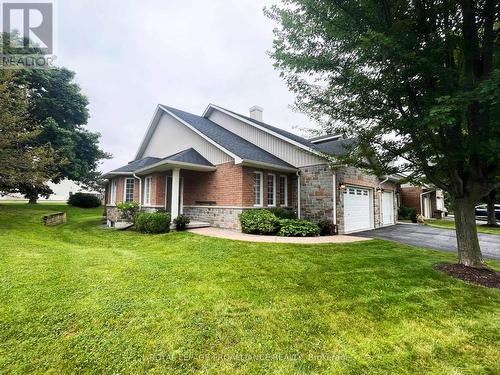 20 Village Crescent, Peterborough (Otonabee), ON - Outdoor With Deck Patio Veranda With Facade