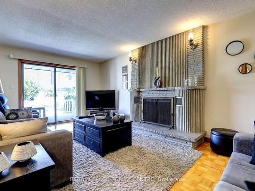 71 Fairview Rd W, Mississauga, ON - Indoor Photo Showing Living Room With Fireplace