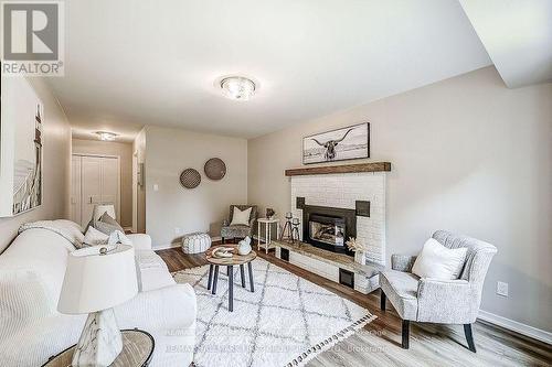 41 Renwick Road, Clarington (Courtice), ON - Indoor Photo Showing Living Room With Fireplace