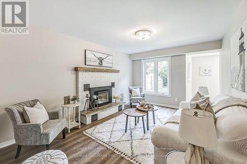 41 Renwick Road, Clarington (Courtice), ON - Indoor Photo Showing Living Room With Fireplace