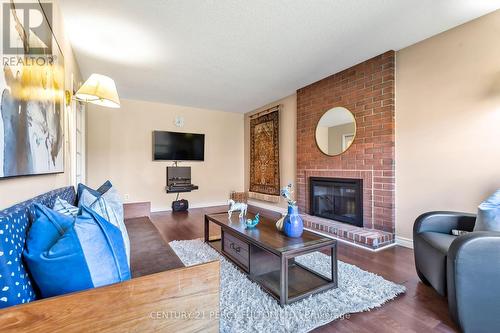 48 Mayor Crescent, Ajax, ON - Indoor Photo Showing Living Room With Fireplace