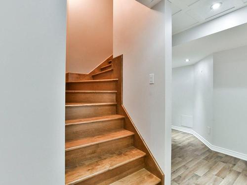 Staircase - 125 Rue Du Bonniebrook, Saint-Colomban, QC - Indoor Photo Showing Other Room