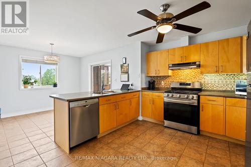 5295 Beavercreek Crescent, West Lincoln, ON - Indoor Photo Showing Kitchen With Double Sink