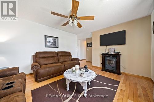 16 Harbourview Crescent, Prince Edward County (Wellington), ON - Indoor Photo Showing Living Room With Fireplace