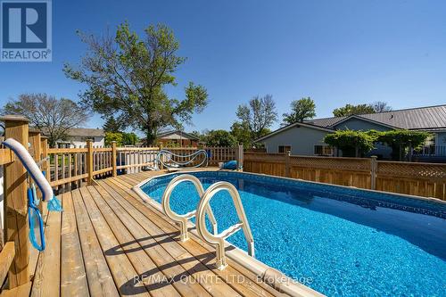 16 Harbourview Crescent, Prince Edward County (Wellington), ON - Outdoor With Above Ground Pool With Deck Patio Veranda