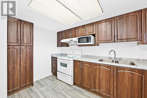 Lph -11 - 2460 Eglington Avenue E, Toronto (Eglinton East), ON - Indoor Photo Showing Kitchen With Double Sink