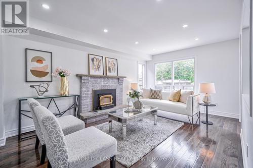 202 Bridgewater Avenue, Whitby (Pringle Creek), ON - Indoor Photo Showing Living Room With Fireplace