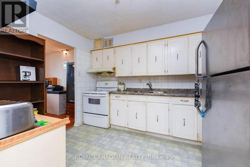 311 - 3577 Derry Road E, Mississauga (Malton), ON - Indoor Photo Showing Kitchen With Double Sink