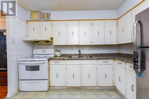 311 - 3577 Derry Road E, Mississauga (Malton), ON - Indoor Photo Showing Kitchen With Double Sink