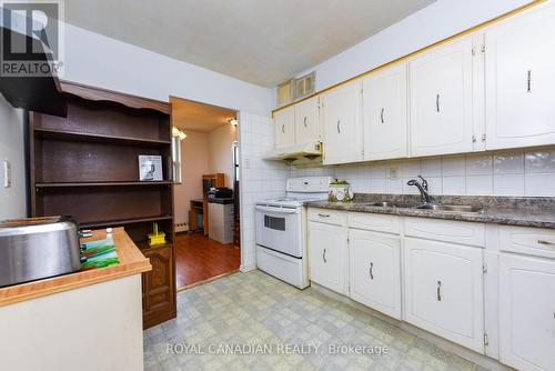 311 - 3577 Derry Road E, Mississauga (Malton), ON - Indoor Photo Showing Kitchen With Double Sink