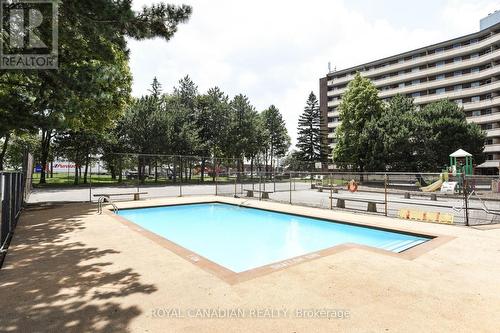 311 - 3577 Derry Road E, Mississauga (Malton), ON - Outdoor With In Ground Pool