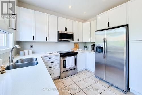 3263 Mccurdy Court, Burlington (Alton), ON - Indoor Photo Showing Kitchen With Stainless Steel Kitchen With Double Sink