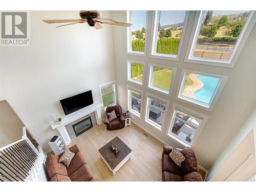 357 Quilchena Drive, Kelowna, BC - Indoor Photo Showing Other Room With Fireplace