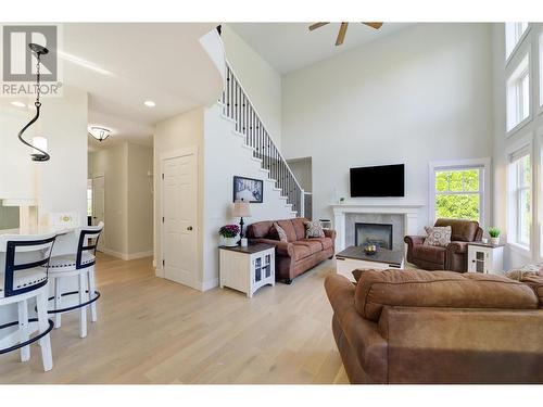 357 Quilchena Drive, Kelowna, BC - Indoor Photo Showing Living Room With Fireplace