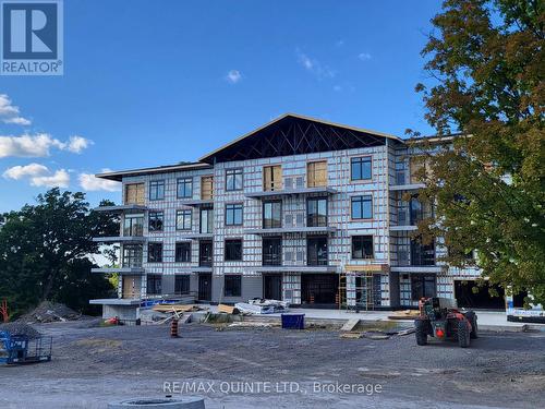 308 - 12 Clara Drive, Prince Edward County (Picton), ON - Outdoor With Balcony With Facade