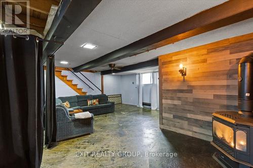 82 Outlet Road, Prince Edward County (Athol), ON - Indoor Photo Showing Other Room With Fireplace