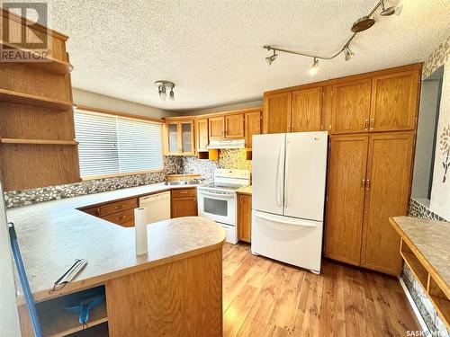 35 Plaxton Place, Prince Albert, SK - Indoor Photo Showing Kitchen With Double Sink