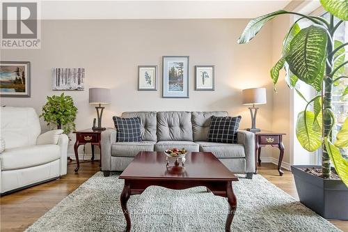 212 - 383 Main Street E, Milton (Old Milton), ON - Indoor Photo Showing Living Room