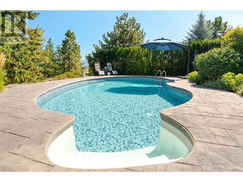 559 Long Ridge Drive S, Kelowna, BC - Outdoor With In Ground Pool With Backyard