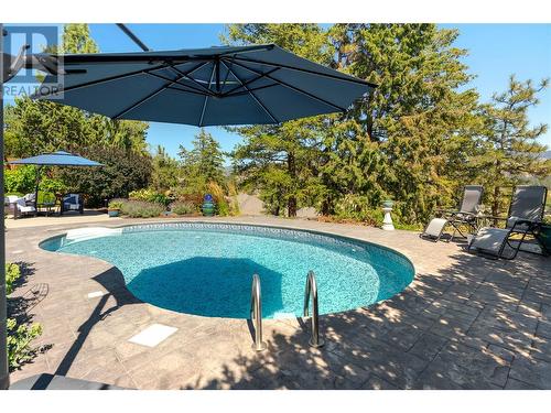 559 Long Ridge Drive S, Kelowna, BC - Outdoor With In Ground Pool With Backyard