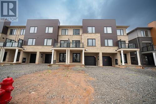 122 - 11 Roxanne Drive, Hamilton (Mcquesten), ON - Outdoor With Balcony With Facade