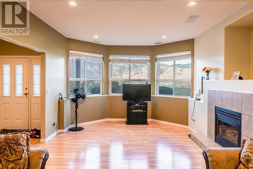 4208 Golf Course Drive, Osoyoos, BC - Indoor Photo Showing Living Room With Fireplace