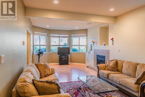 4208 Golf Course Drive, Osoyoos, BC - Indoor Photo Showing Living Room With Fireplace