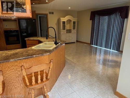 590 Dutrisac Road, Sturgeon Falls, ON - Indoor Photo Showing Kitchen With Double Sink