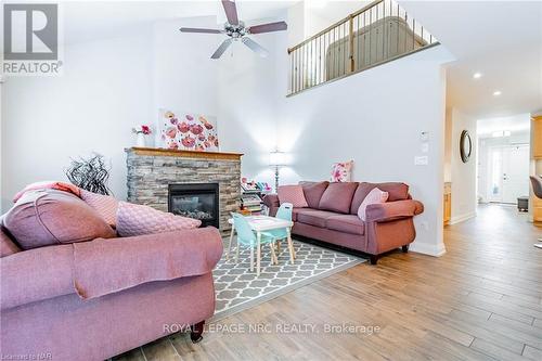 25 - 7 Gibson Place, St. Catharines, ON - Indoor Photo Showing Living Room With Fireplace