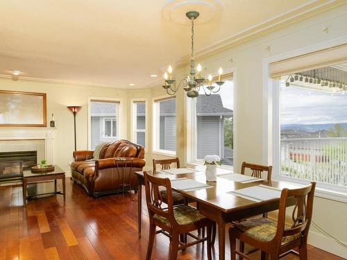 2355 Regent Place, Kamloops, BC - Indoor Photo Showing Dining Room With Fireplace