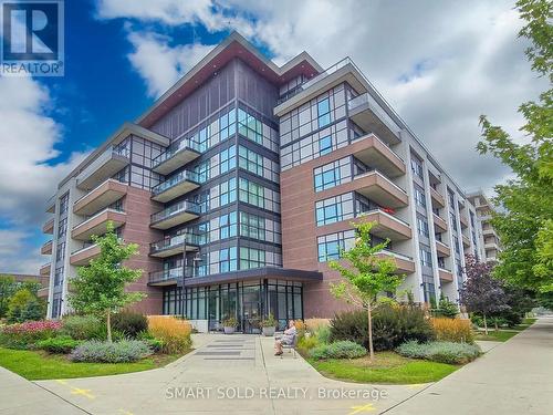 214 - 1 Neighbourhood Lane, Toronto (Stonegate-Queensway), ON - Outdoor With Balcony With Facade