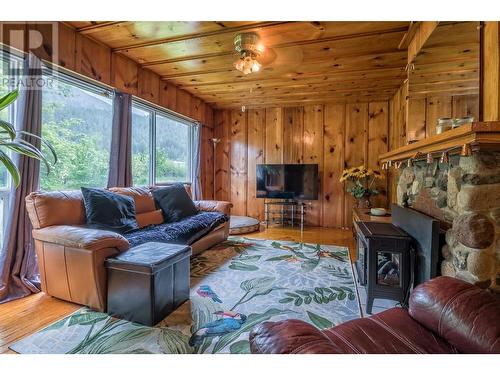 5709 Vla Rd, Chase, BC - Indoor Photo Showing Living Room With Fireplace