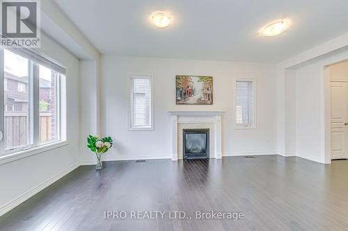 104 Colville Place, Milton (Ford), ON - Indoor Photo Showing Living Room With Fireplace