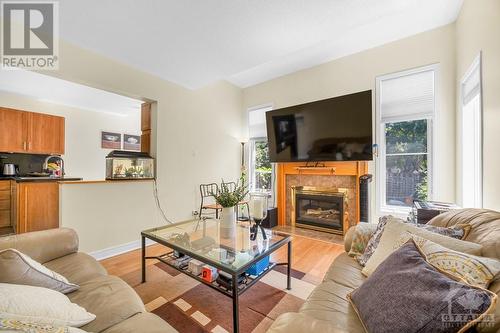 114 Longshire Circle, Ottawa, ON - Indoor Photo Showing Living Room With Fireplace