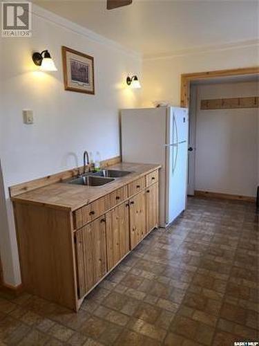 48 Main Street, Manor, SK - Indoor Photo Showing Kitchen With Double Sink