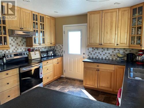 13040 Prince Subdivision, Dawson Creek, BC - Indoor Photo Showing Kitchen With Double Sink