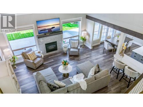 2521 Quail Place, Kelowna, BC - Indoor Photo Showing Living Room With Fireplace