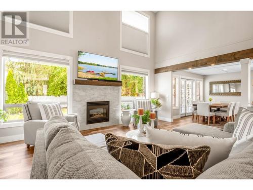 2521 Quail Place, Kelowna, BC - Indoor Photo Showing Living Room With Fireplace