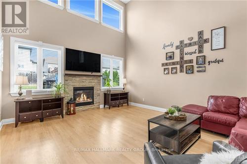 209 Opale Street, Prescott And Russell, ON - Indoor Photo Showing Living Room With Fireplace