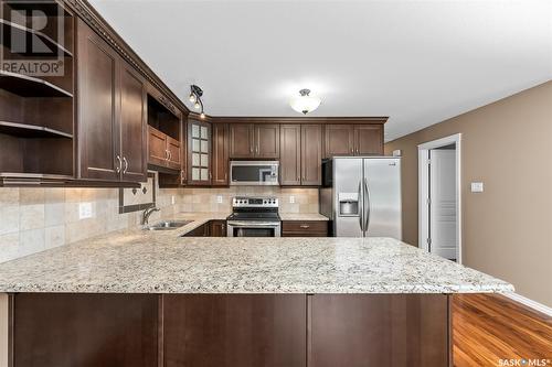 110 851 Chester Road, Moose Jaw, SK - Indoor Photo Showing Kitchen With Upgraded Kitchen