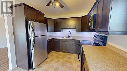 7919 97 Avenue, Fort St. John, BC - Indoor Photo Showing Kitchen With Double Sink