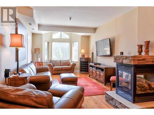 3996 Beach Avenue Unit# 221, Peachland, BC - Indoor Photo Showing Living Room With Fireplace