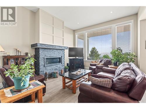 6536 Blackcomb Place, Vernon, BC - Indoor Photo Showing Living Room With Fireplace