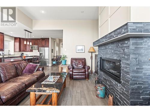 6536 Blackcomb Place, Vernon, BC - Indoor Photo Showing Living Room With Fireplace