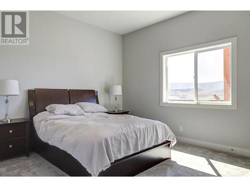 7716 Okanagan Hills Boulevard Unit# 2, Vernon, BC - Indoor Photo Showing Bedroom