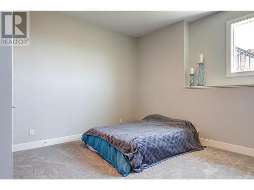 7716 Okanagan Hills Boulevard Unit# 2, Vernon, BC - Indoor Photo Showing Bedroom