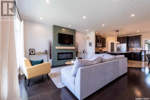 62 Belmont Crescent, Moose Jaw, SK - Indoor Photo Showing Living Room With Fireplace