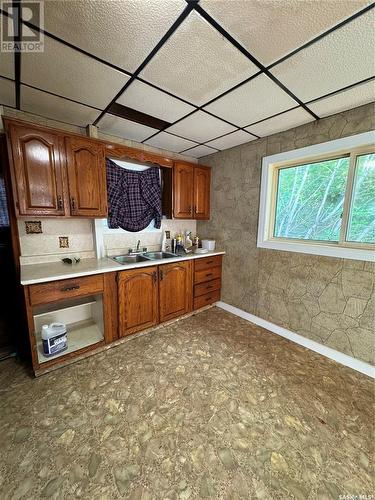 910 17Th Street W, Prince Albert, SK - Indoor Photo Showing Kitchen With Double Sink