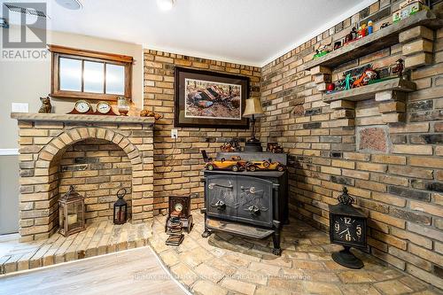 122 Gilson Point Road, Kawartha Lakes (Little Britain), ON - Indoor Photo Showing Other Room With Fireplace