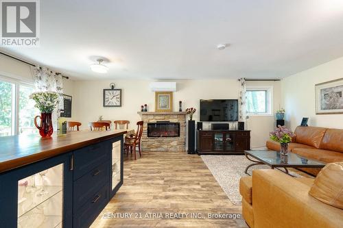 1335 Furniss Drive, Ramara (Brechin), ON - Indoor Photo Showing Living Room With Fireplace